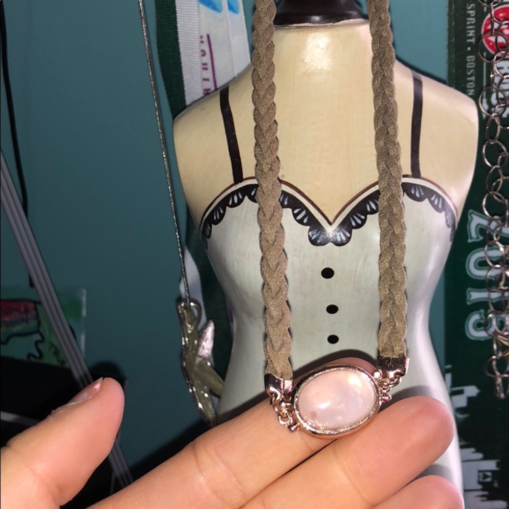 Brown rope necklace with jewel pendant